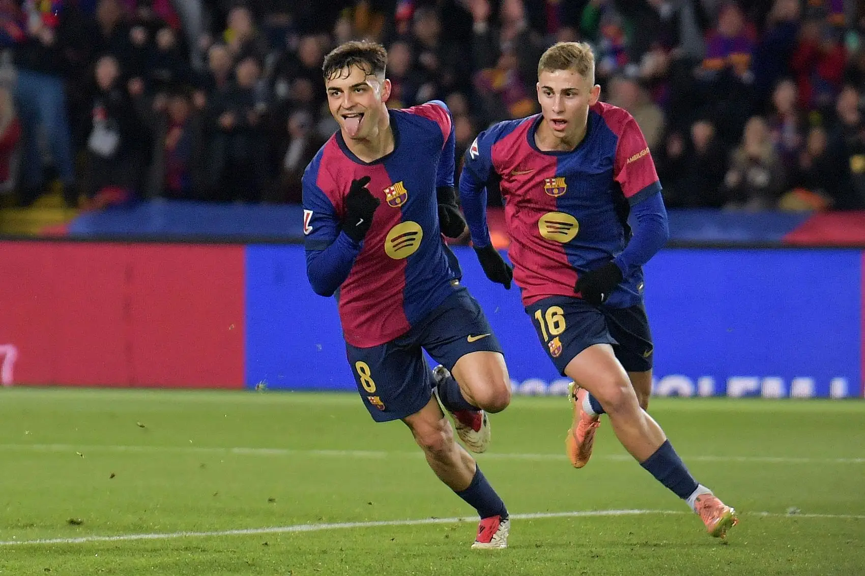 包含巴塞罗那战胜马德里竞技，取得西甲领先优势的词条